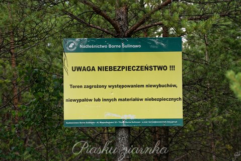 Znak ostrzegający o terenie zagrożonym występowaniem niewybuchów